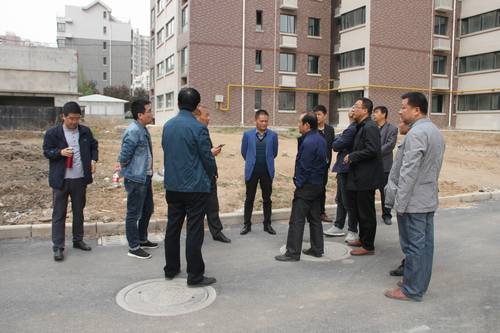 銅煤公司承建的銅煤2#小區(qū)水仙居5、6、7、8#樓順利通過竣工驗收